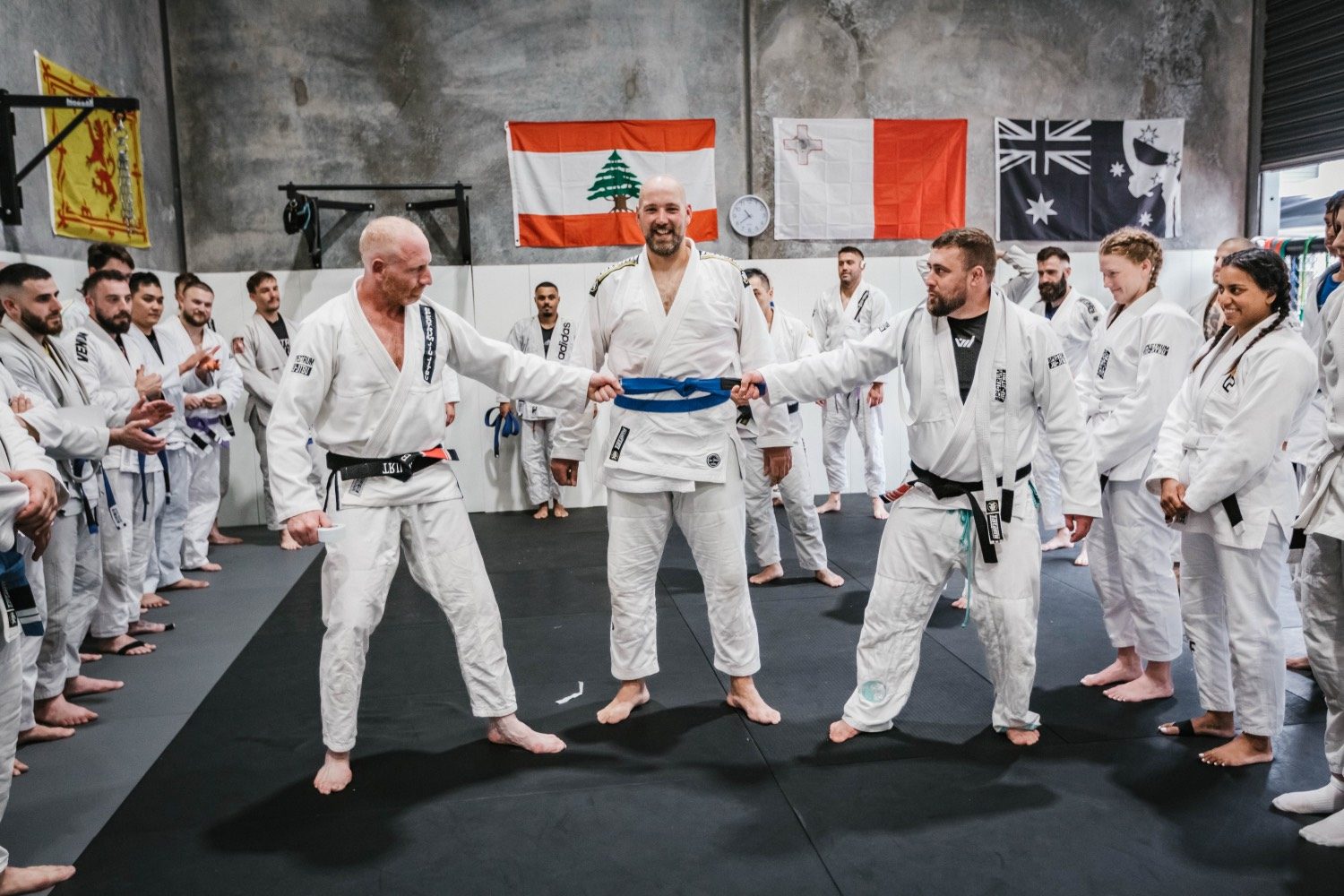Blue belt promotion on the mats
