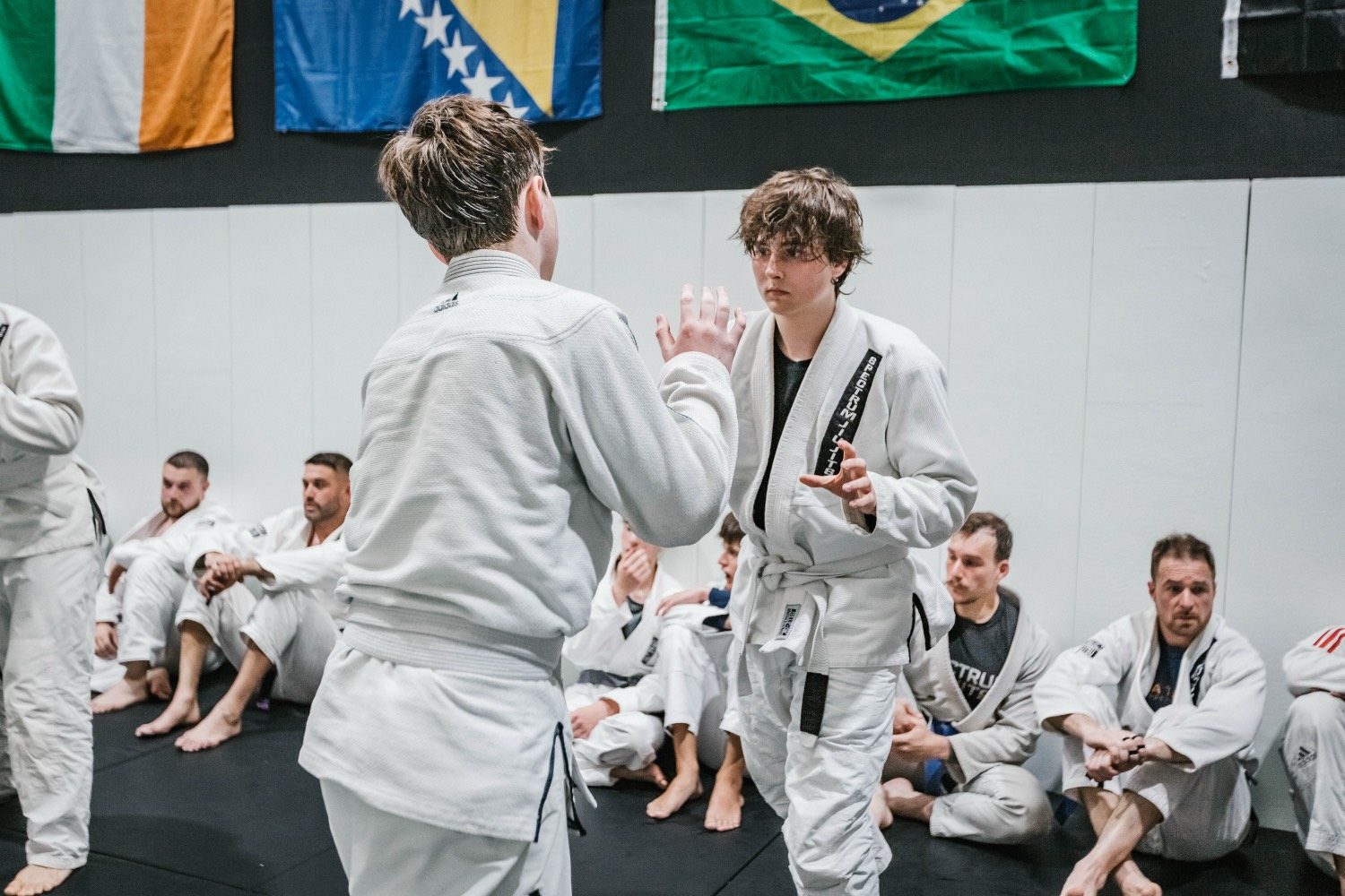 Junior students standing up in class