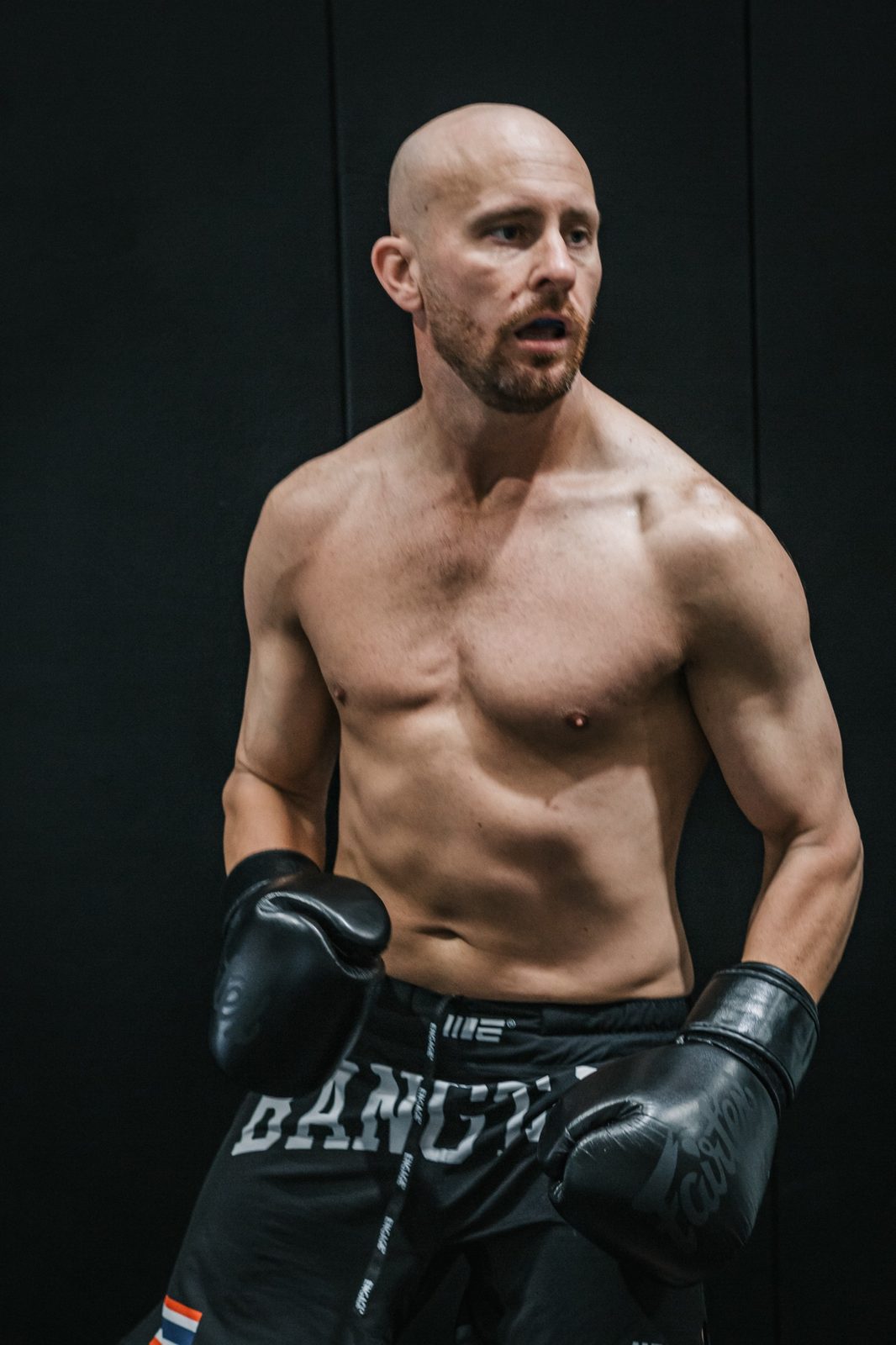 Professor Ryan Barry with boxing gloves