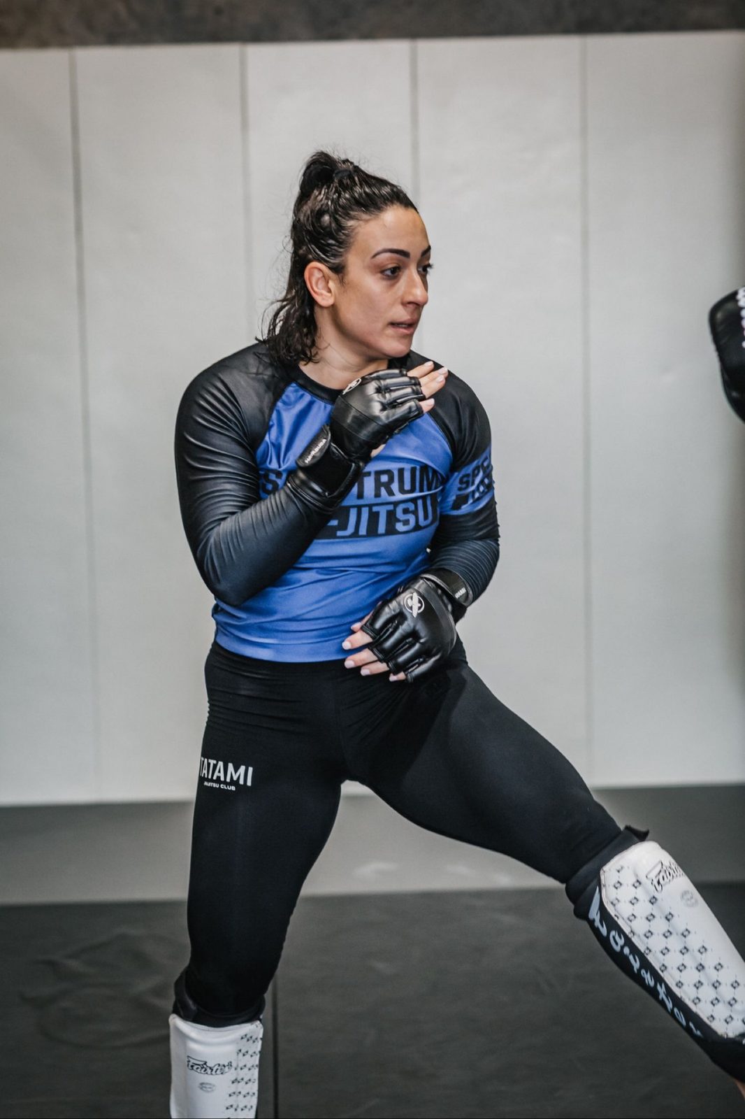 Women’s MMA in a Spectrum rashguard