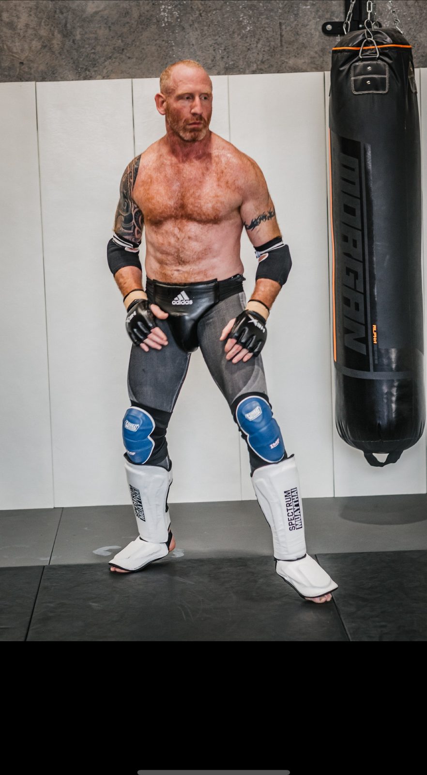 Ryan in Spectrum Muay Thai shin guards