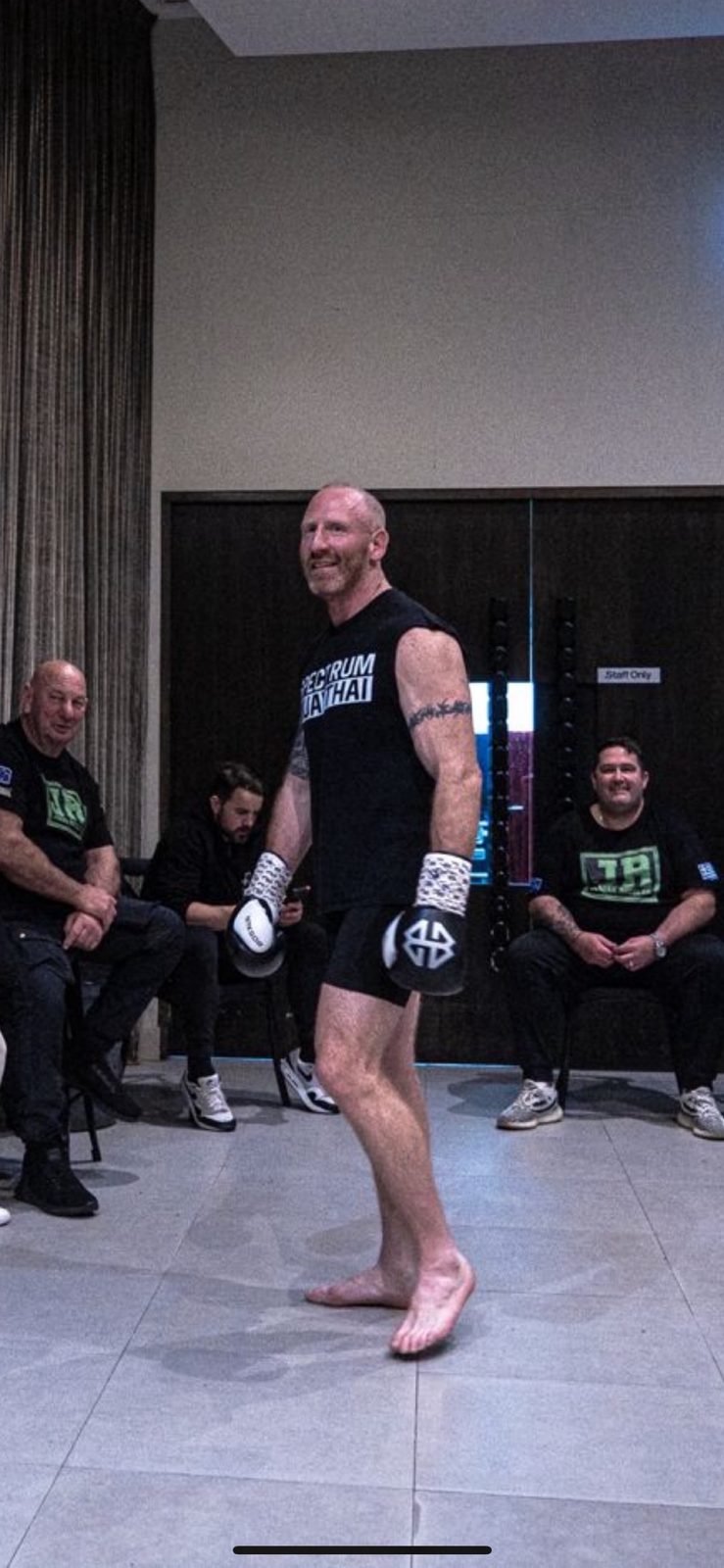 Ryan walkout in a Spectrum Muay Thai shirt
